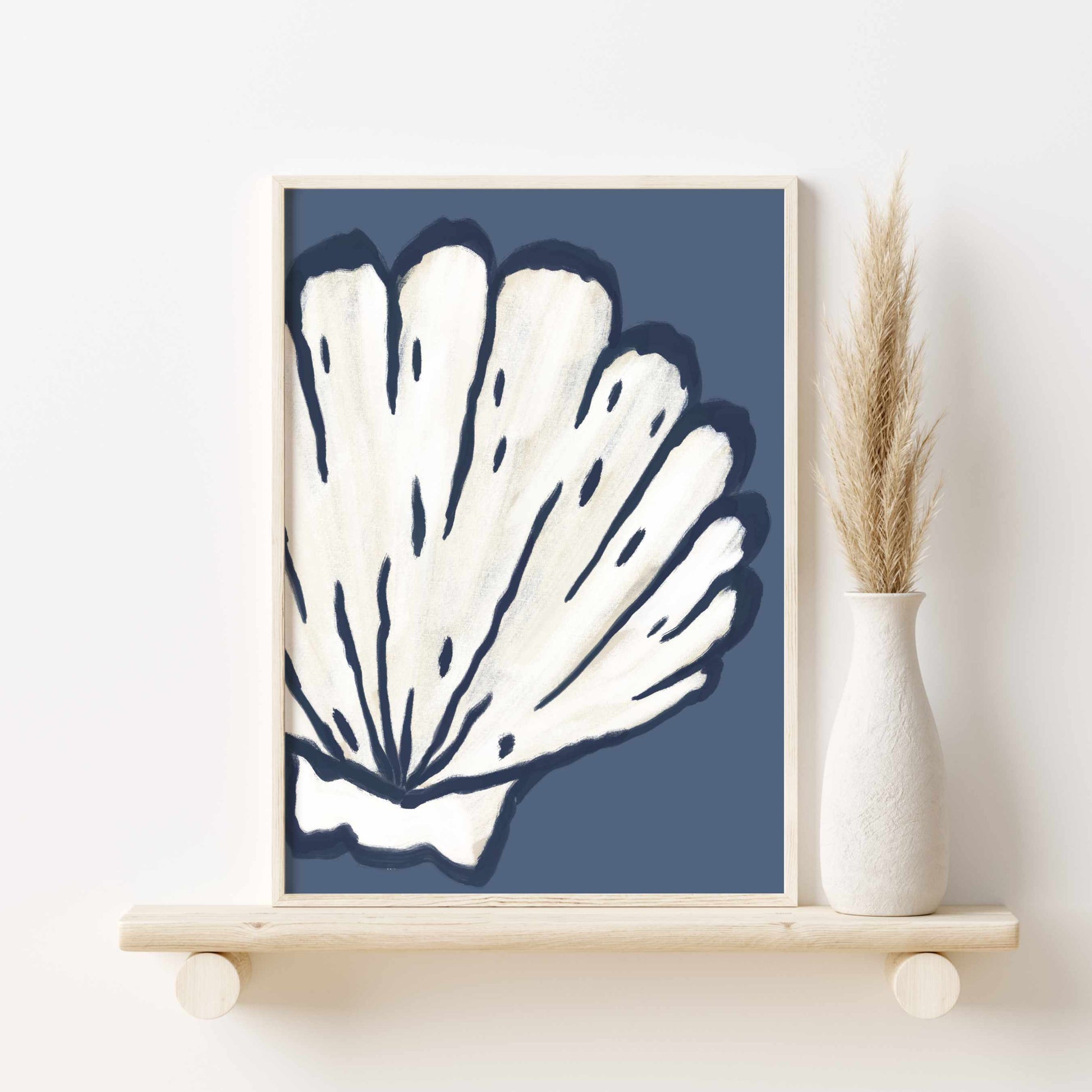 a picture of a blue and white seashell on a shelf
