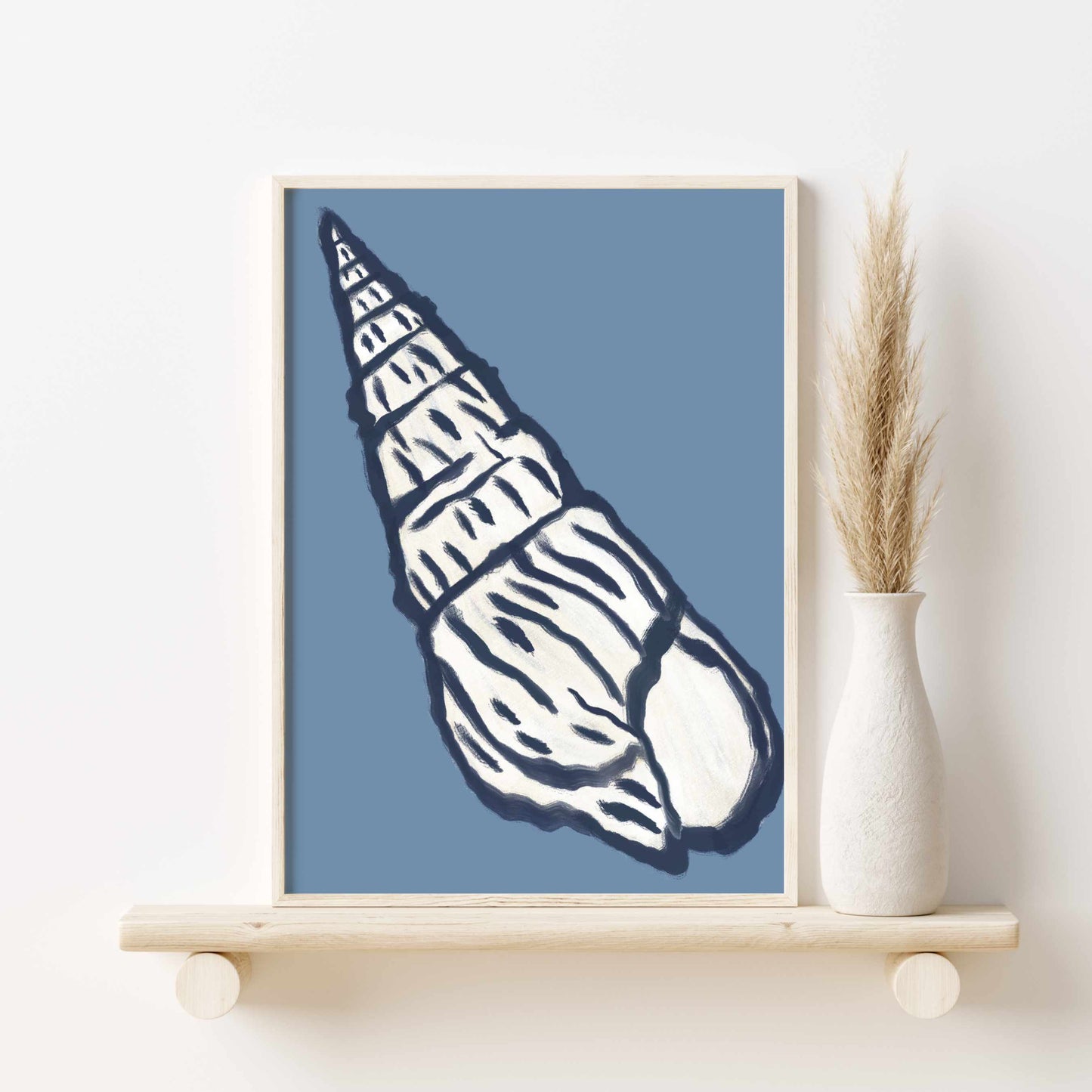 a picture of a seashell on a shelf