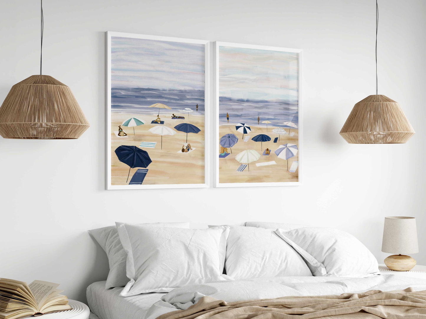 two paintings hang above a bed in a bedroom
