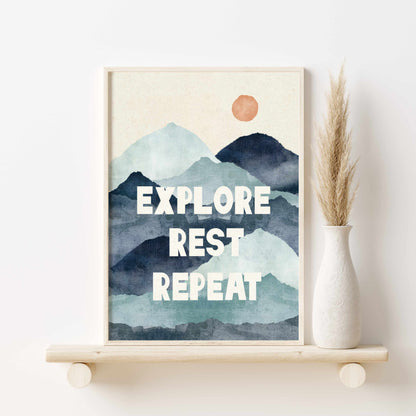 a picture of a mountain with the words explore rest repeat