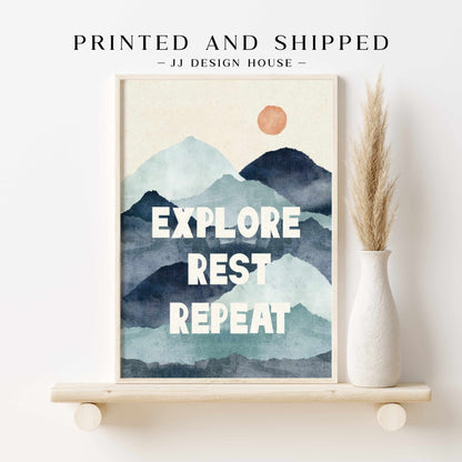 a picture of a mountain with the words explore rest repeat